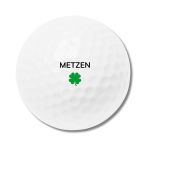 Golf ball with a clover logo.